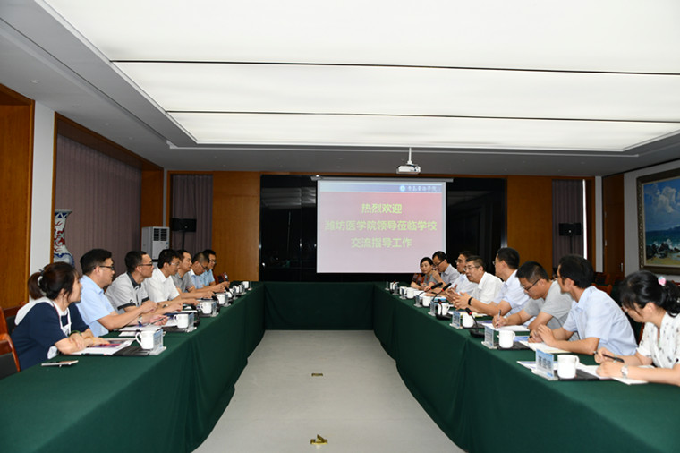 潍坊医学院学生工作处处长丁木金一行来冰球官网考察交流